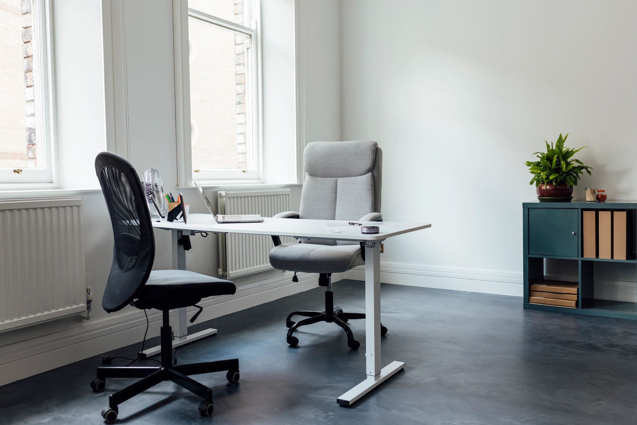 Organized office workspace supporting administrative follow-through